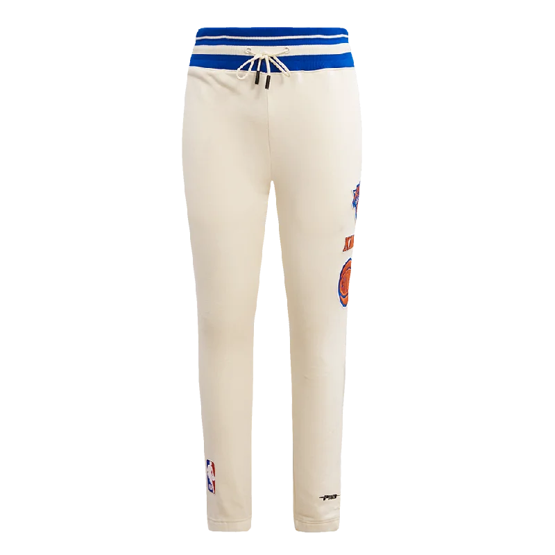 Bargain Bin NBA NEW YORK KNICKS RETRO CLASSIC MEN'S SWEATPANT (EGGSHELL/ ROYAL BLUE) Bargain Bin NBA NEW YORK KNICKS RETRO CLASSIC MEN'S SWEATPANT (EGGSHELL/ ROYAL BLUE)