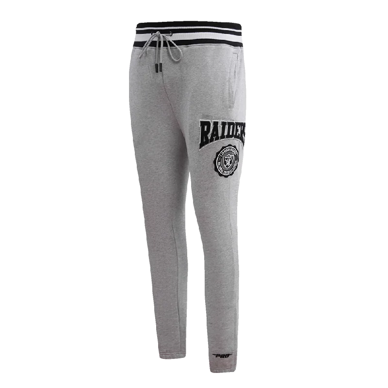 Online Only NFL LAS VEGAS RAIDERS CREST EMBLEM MEN'S RIB SWEATPANT (HEATHER GRAY/BLACK) Online Only NFL LAS VEGAS RAIDERS CREST EMBLEM MEN'S RIB SWEATPANT (HEATHER GRAY/BLACK)